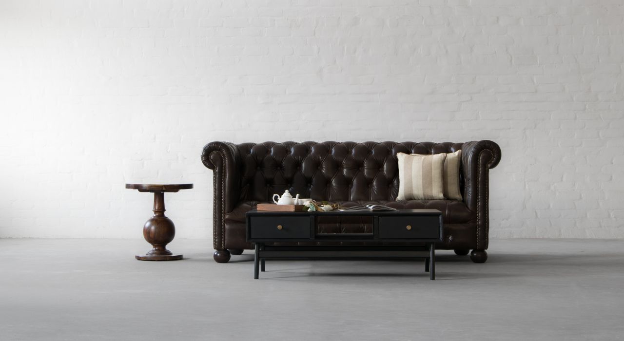 Curb the Winter Woes with our Manchester Chesterfield Sofa.