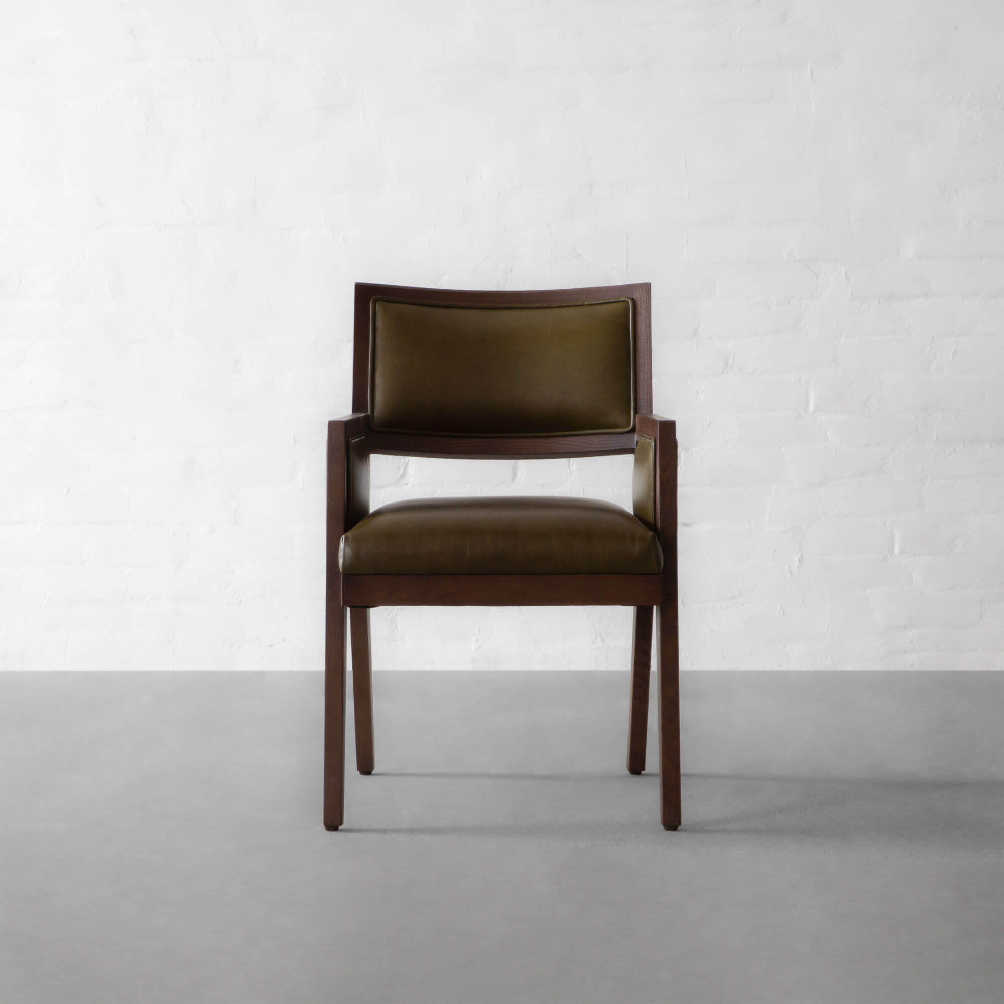 CALCUTTA UPHOLSTERED LEATHER CHAIR