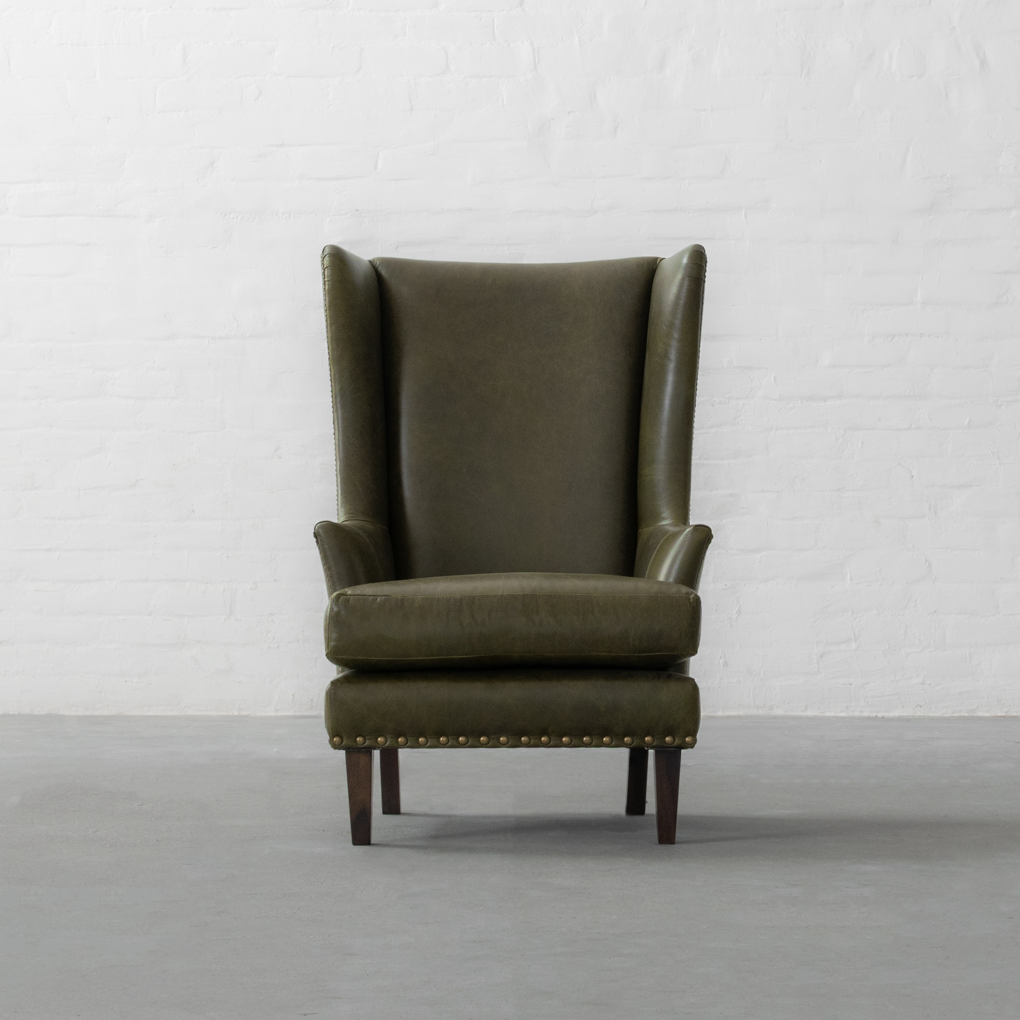 Candolim Leather Wingback Chair Candolim Leather Wingback Chair