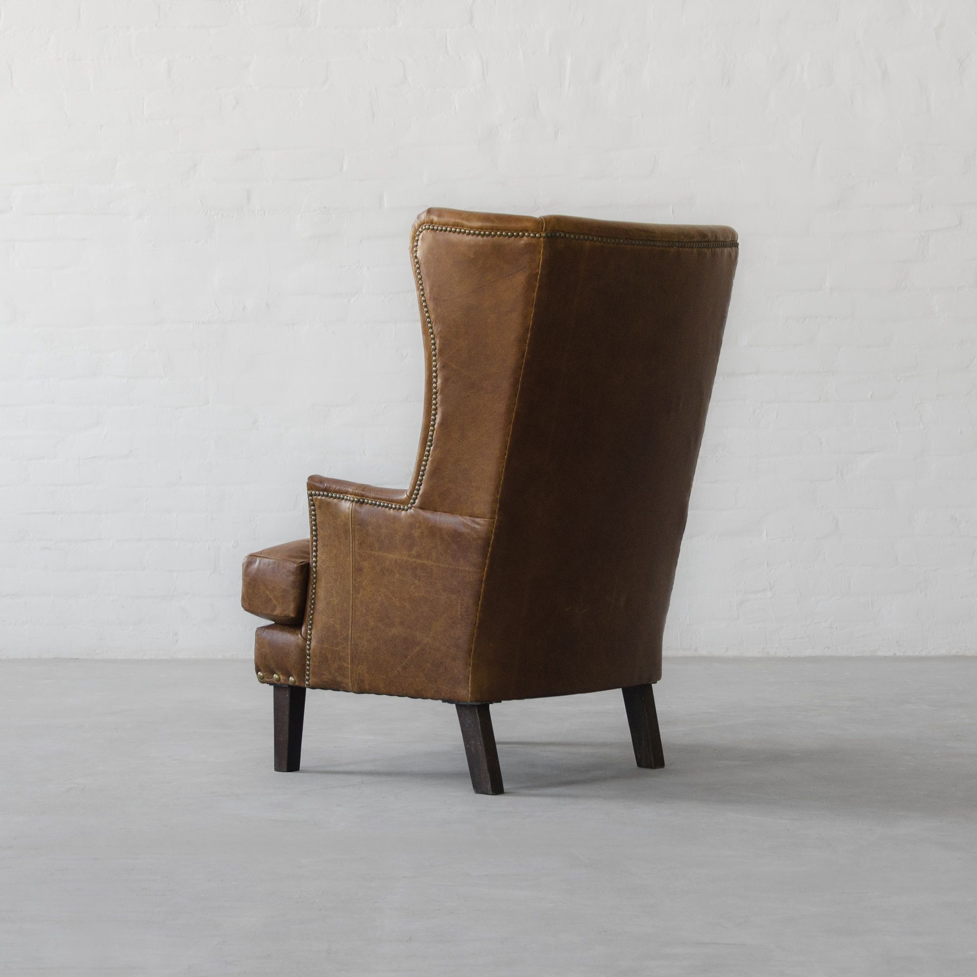 Candolim Leather Wingback Chair