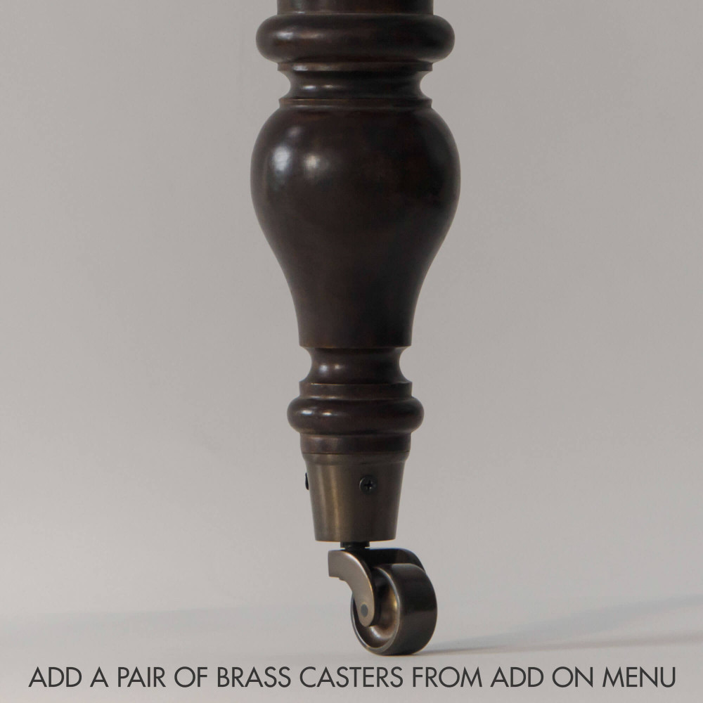 A Pair of Brass Casters