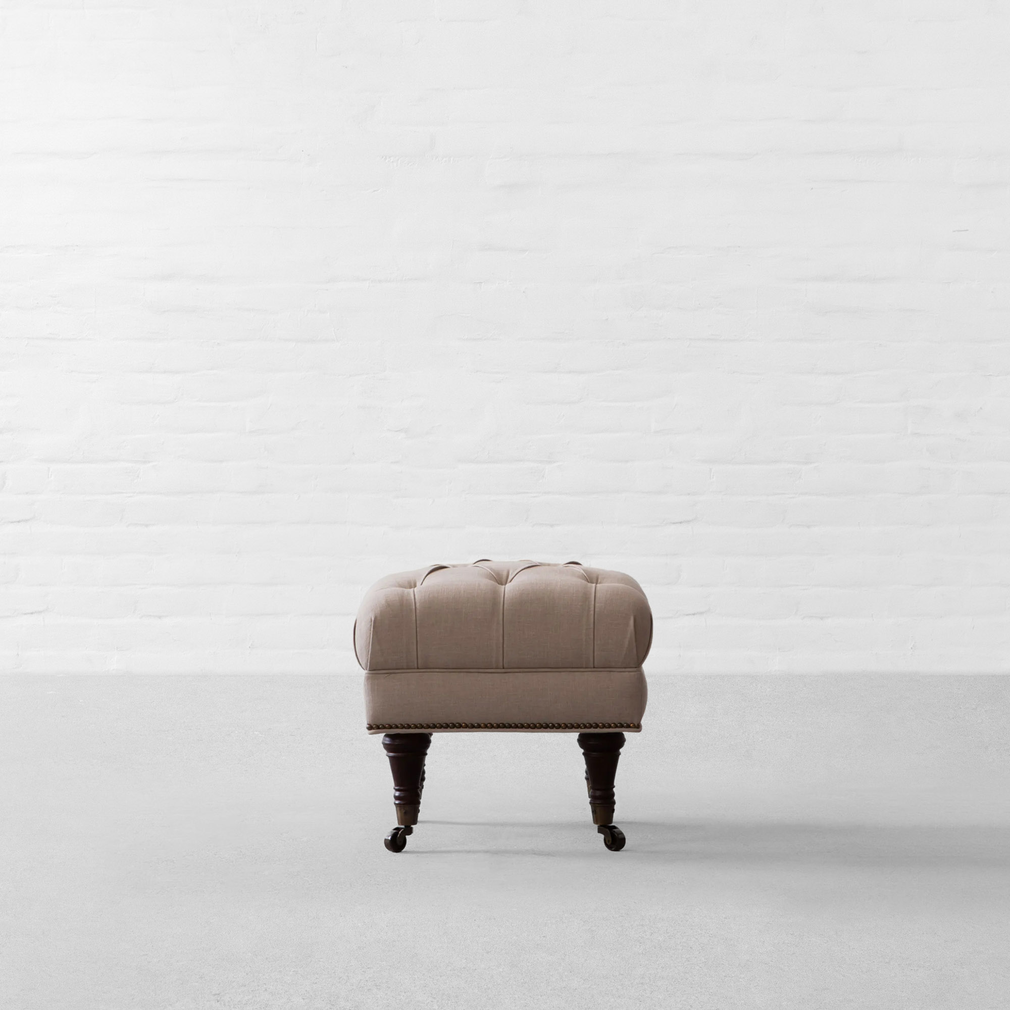 RYAN UPHOLSTERED OTTOMAN